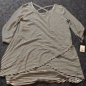 black and white shirt with cross in the back